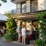 Airbnb management Brisbane with guests checking in at a vibrant city property, showcasing local hospitality and charm.