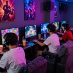 Engaging adults enjoying nsfw games in a colorful gaming lounge.